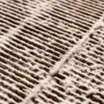 Close-up texture of fabric surface with fibers, linked to HVAC maintenance by Jerry Brittingham A/C & Heat, Inc.