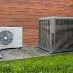 Two air conditioning units in an outdoor setting, showcasing HVAC solutions from Jerry Brittingham A/C & Heat, Inc.