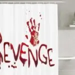 Halloween-themed shower curtain featuring the word "Revenge" in red splatter and a bloody handprint, ideal for creating a spooky bathroom atmosphere.