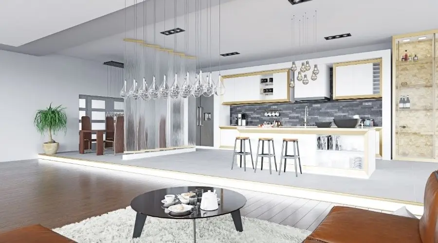 Modern kitchen and living area featuring sleek cabinetry, stylish bar stools, and contemporary lighting, emphasizing home remodeling and water filtration solutions.