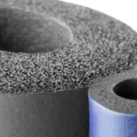 Circular foam pieces in various textures and colors for plumbing insulation to prevent frozen pipes during winter.