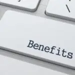 Close-up of a keyboard key labeled "Benefits" for HVAC maintenance and troubleshooting advice by Charles Krull & Son, Inc.