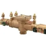 Brass water valve with connection points and control knobs for efficient backflow testing and plumbing services.