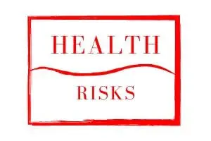 Health risks sign in red text, emphasizing the dangers associated with backflow in plumbing systems.