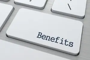 Keyboard key labeled "Benefits," emphasizing advantages of HVAC maintenance and thermostat care.