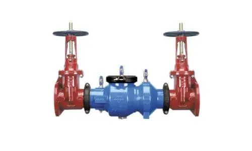 Blue metal valve body with red handles, part of plumbing system by Charles Krull & Son, Inc.