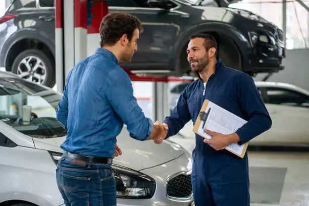 customer-pickup-car-photo "Affordable auto body repair financing options at<br />
Reputation Auto Customs, Santa Ana CA"