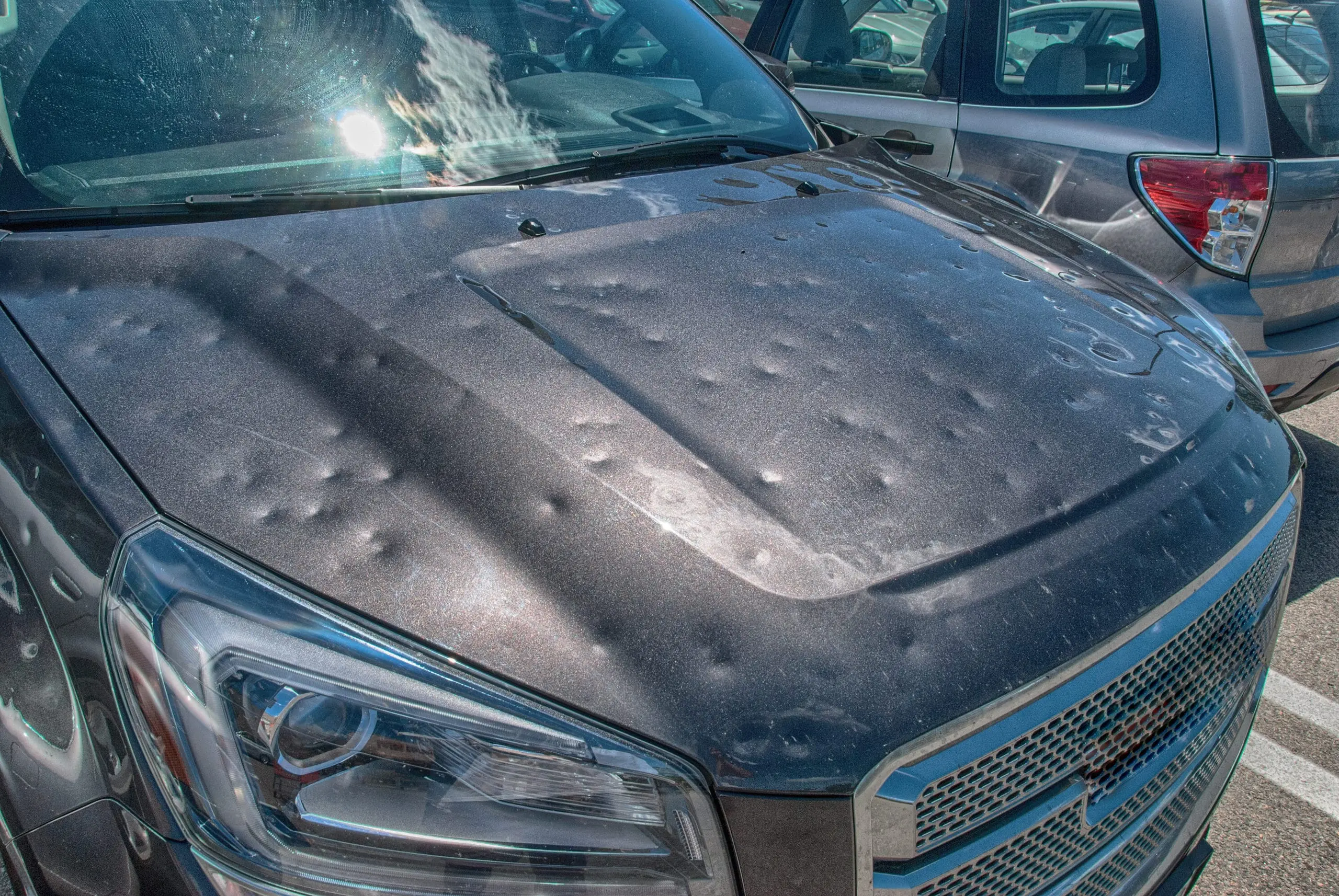 Hail damage repair service for vehicles at Karl Malone's Body & Paint in Draper, Utah