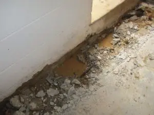 Interior basement drainage system installation to help prevent basement flooding in PA & NJ.