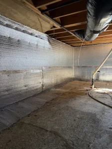 Reflective wall insulation installed during a crawl space encapsulation project in Mount Laurel, NJ to reduce moisture, improve energy efficiency, and protect the home.