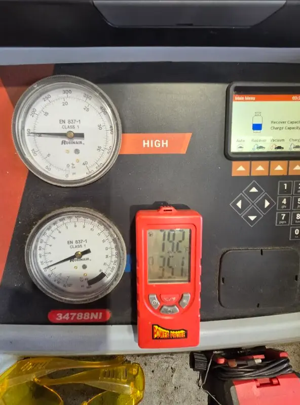 Close up of check the refrigerant and fill the car air conditioner.