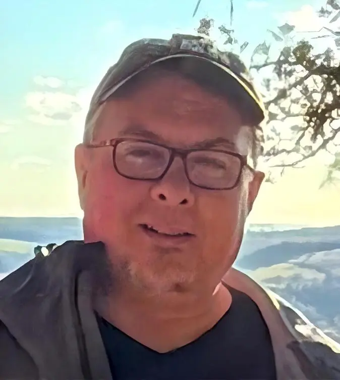 Tony Herman standing outside at Gibraltar Rock in Wisconsin.