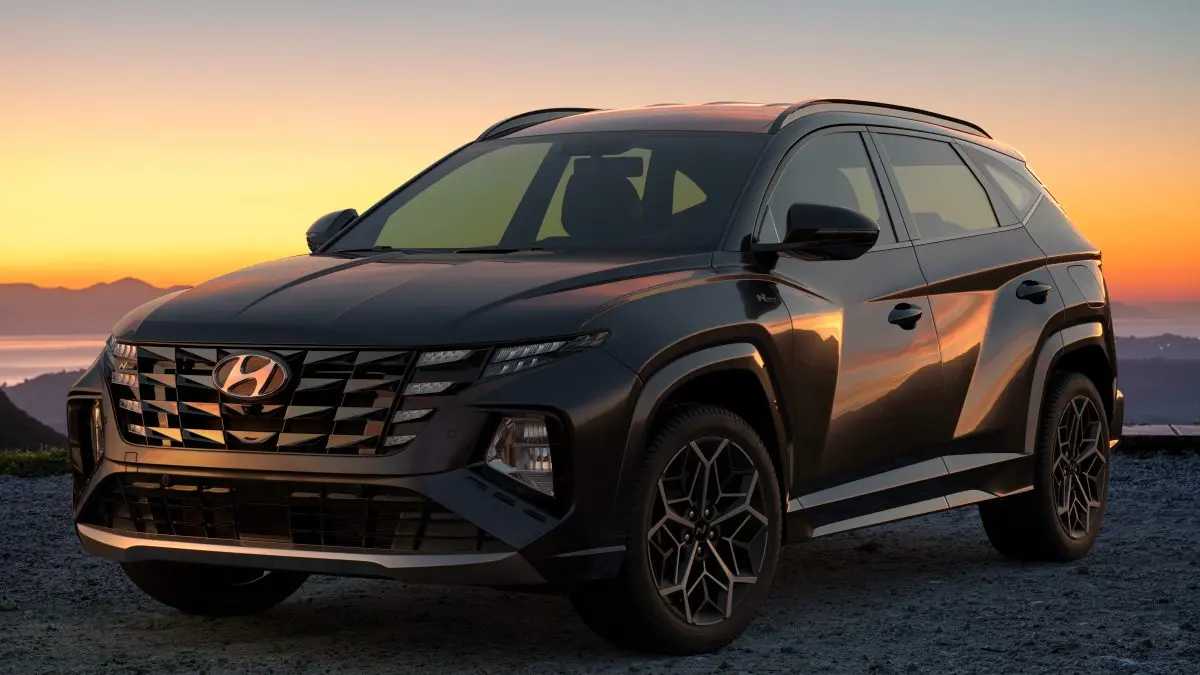 Hyundai SUV parked against a sunset backdrop, showcasing its sleek design and advanced features, representing Deutmeyer Auto Advantage's specialization in Hyundai vehicle service and repair in Dyersville, IA.