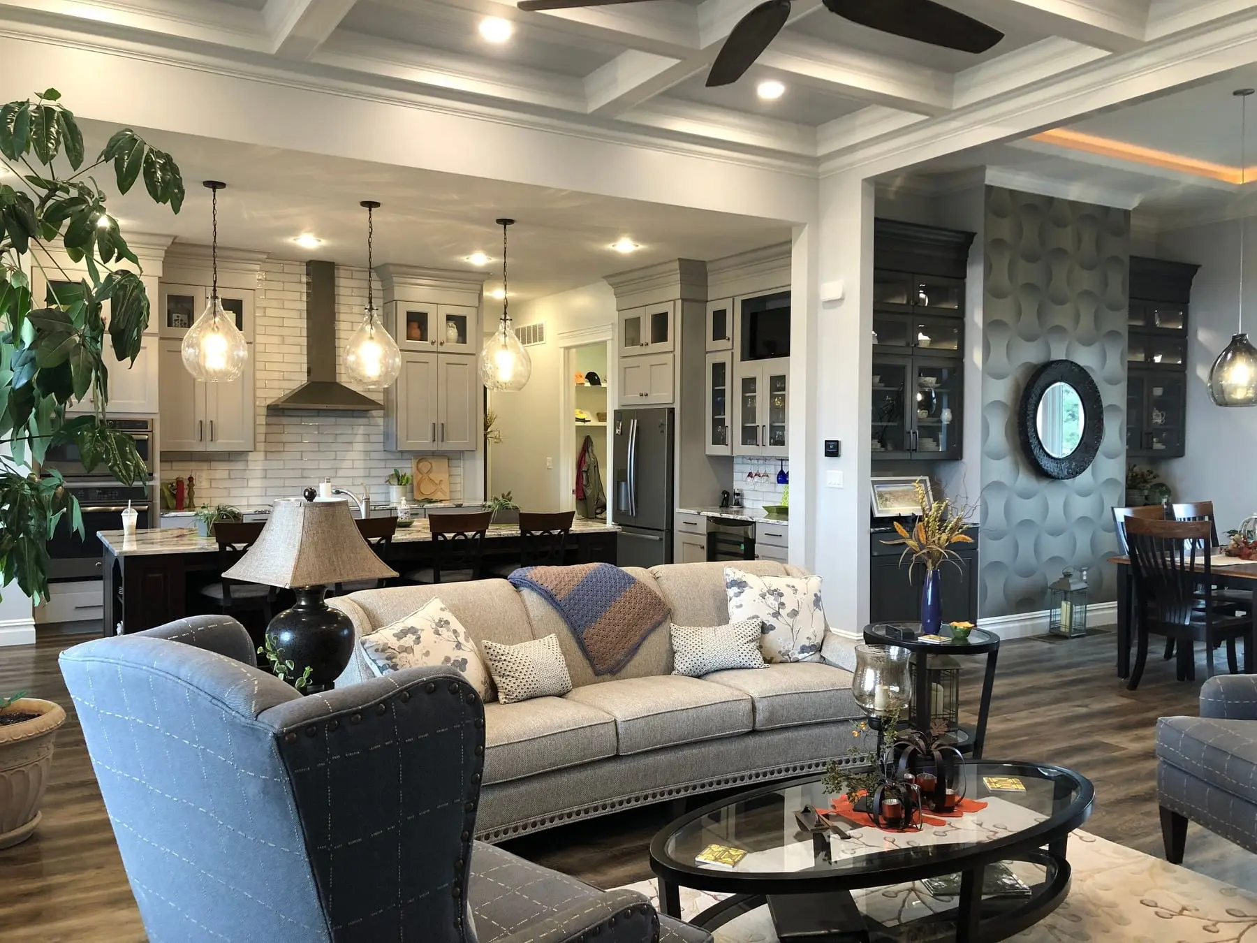 High-end kitchen and living room area in a custom home built by Sutton’s in Springfield IL