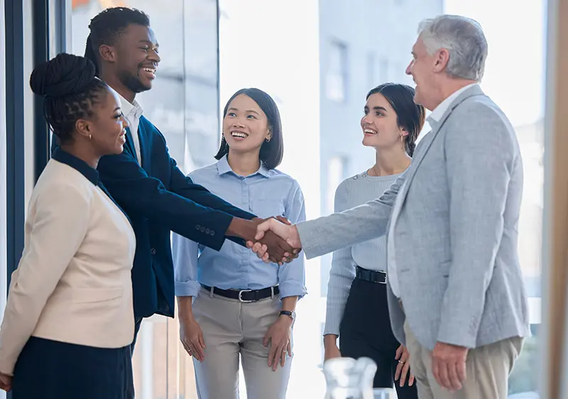 hand-shake-acquisition-and-business-people-happy-2023-02-28-05-49-48-utc shot-of-a-corporate-businessperson-giving-a-presen-2022-09-30-21-50-30-utc