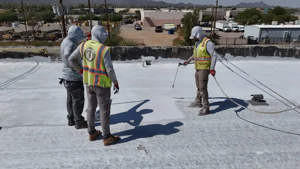 Licensed Tucson roofing contractor installing tile roofing with certified crew under Arizona sun.