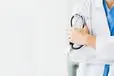 Doctor Holding Stethoscope