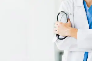 Doctor Holding Stethoscope