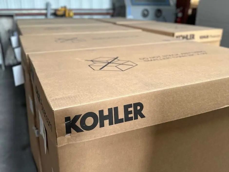 Large box that says Kohler on it