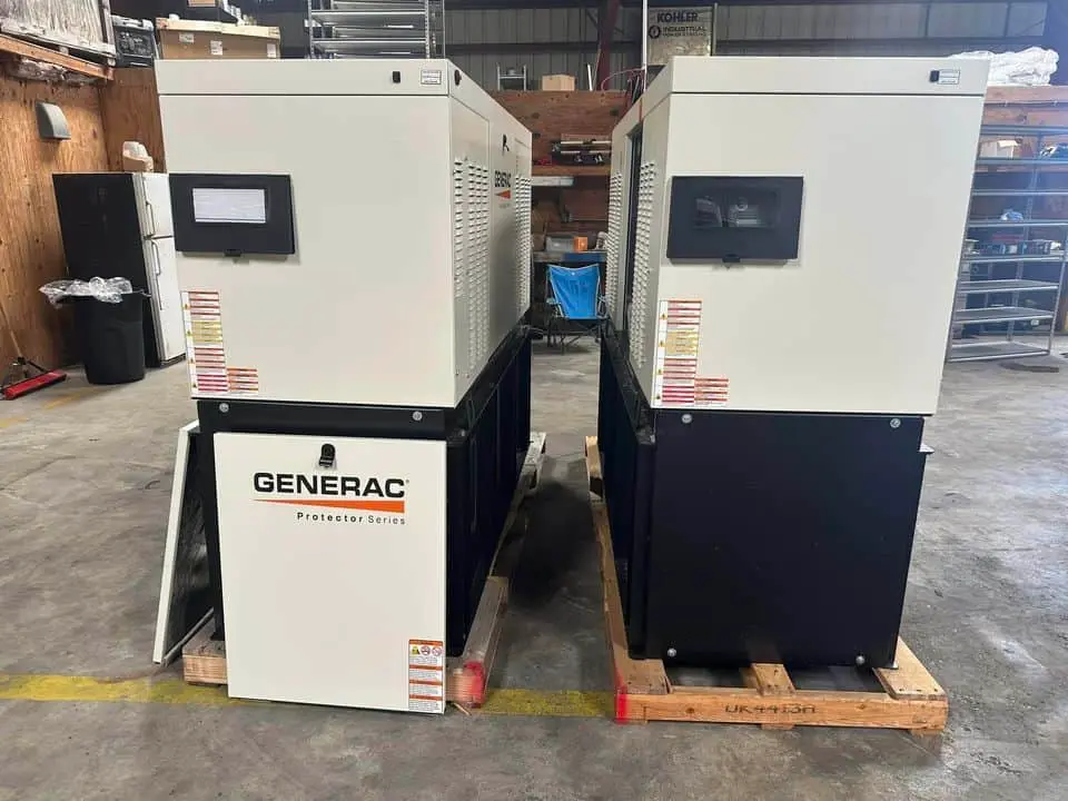 Two Generac generators sitting in shop