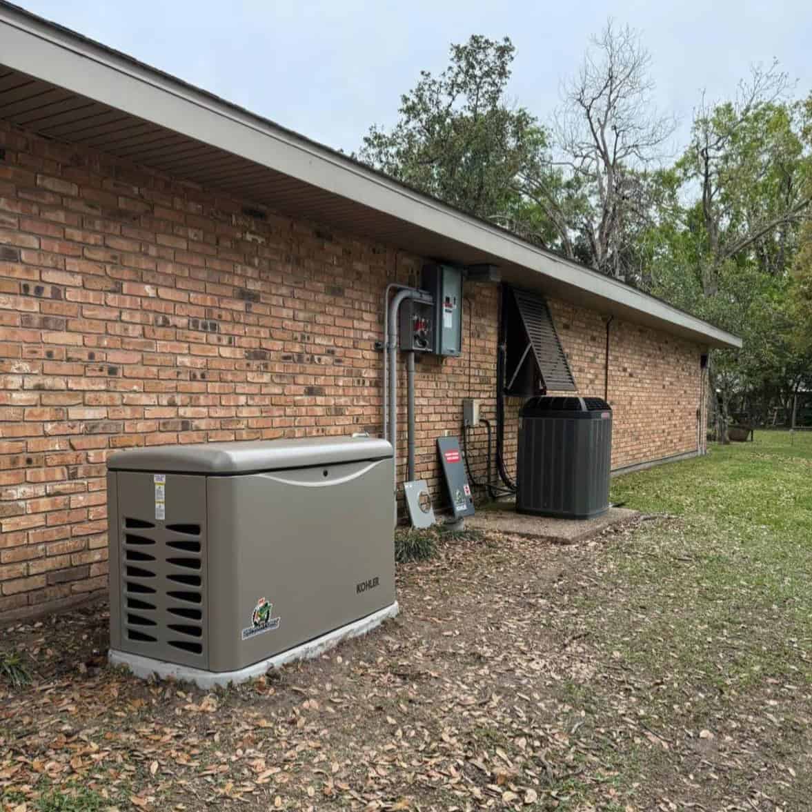 Houma generator 2 New kohler generator installed next to brick home in Covington, LA