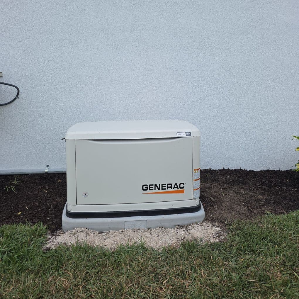 Generac generator installed next to home