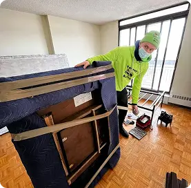 Movers carefully wrap and prepare furniture for home relocation. Takeoff-Moving Toronto