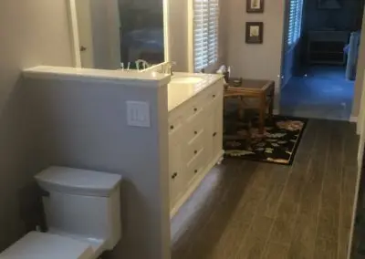 remodeled bathroom floor and cabinets