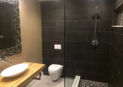 dark shower tile