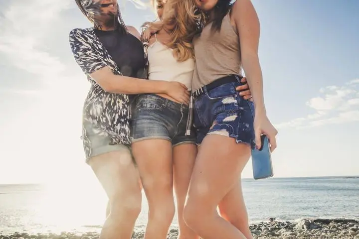 Three women on a beach
