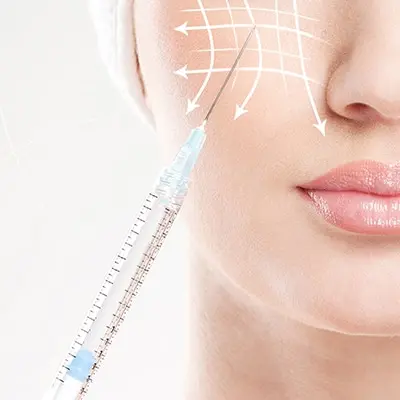 Beautiful face and the syringe