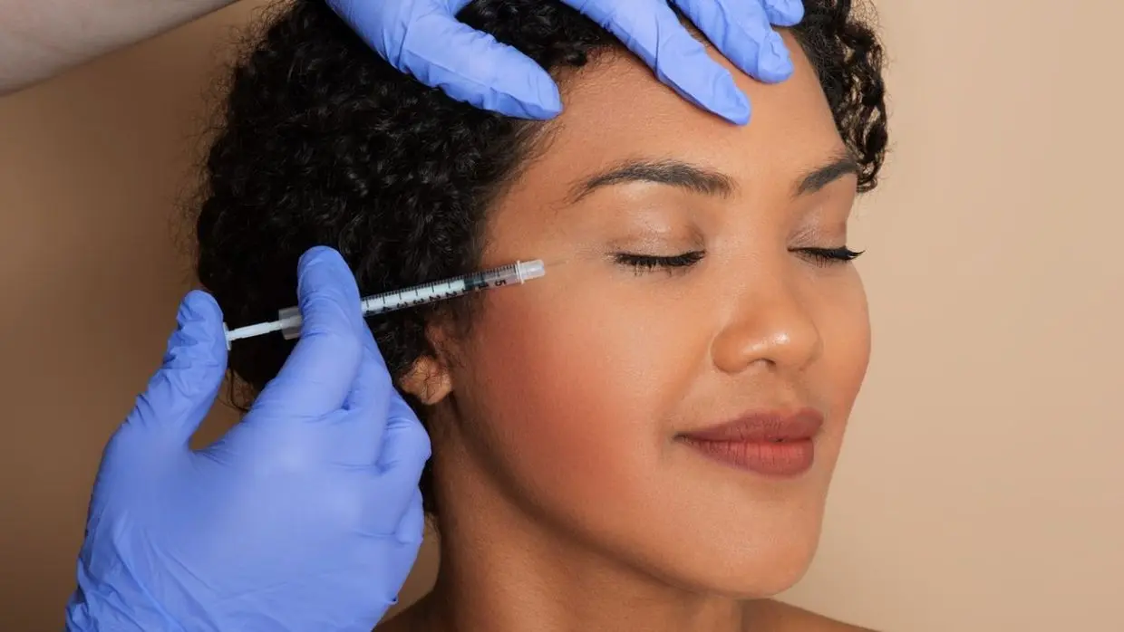 Woman Receiving Filler Injection on Face, Closeup