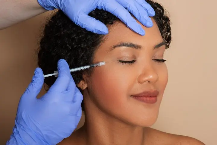 Woman Receiving Filler Injection on Face, Closeup