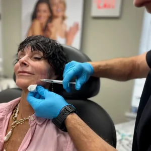 Woman relaxed as she is receiving a SkinVive treatment at Bellezza Moderna