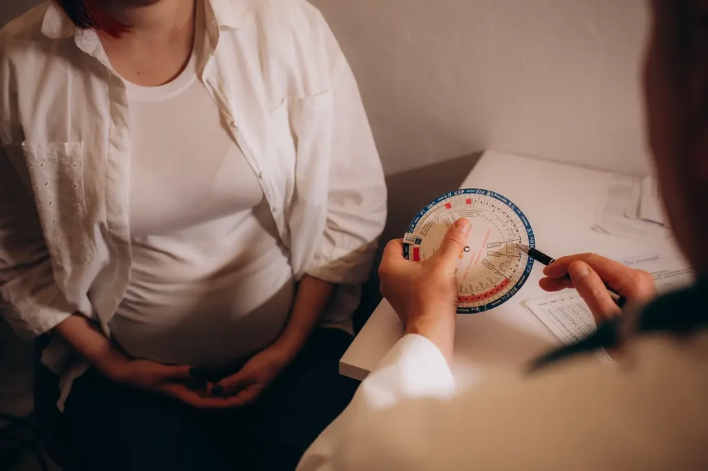 checking on pregnant woman in clinic 2026 09 24 07 52 11 utc