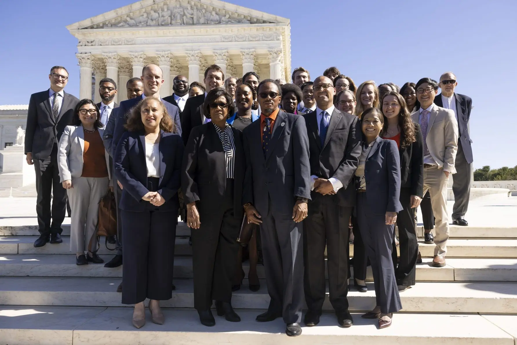 The LDF legal team, co-counsel, and clients stand before the Supreme Court following arguments in Alexander v. South Carolina State Conference of the NAACP.
