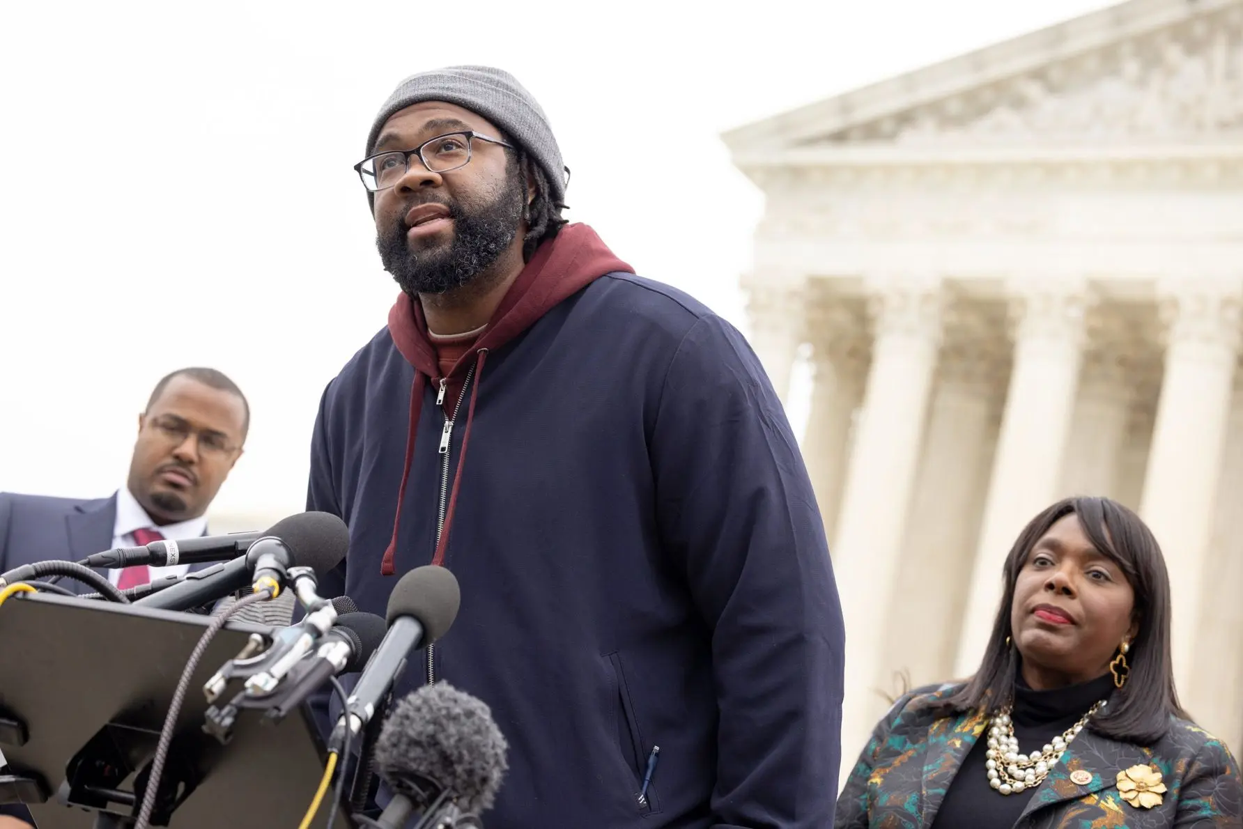 Evan Milligan, named plaintiff in Allen v. Milligan delivers statements to press before the Supreme Court at the conclusion of the argument. Photo by Allison Shelley for LDF.