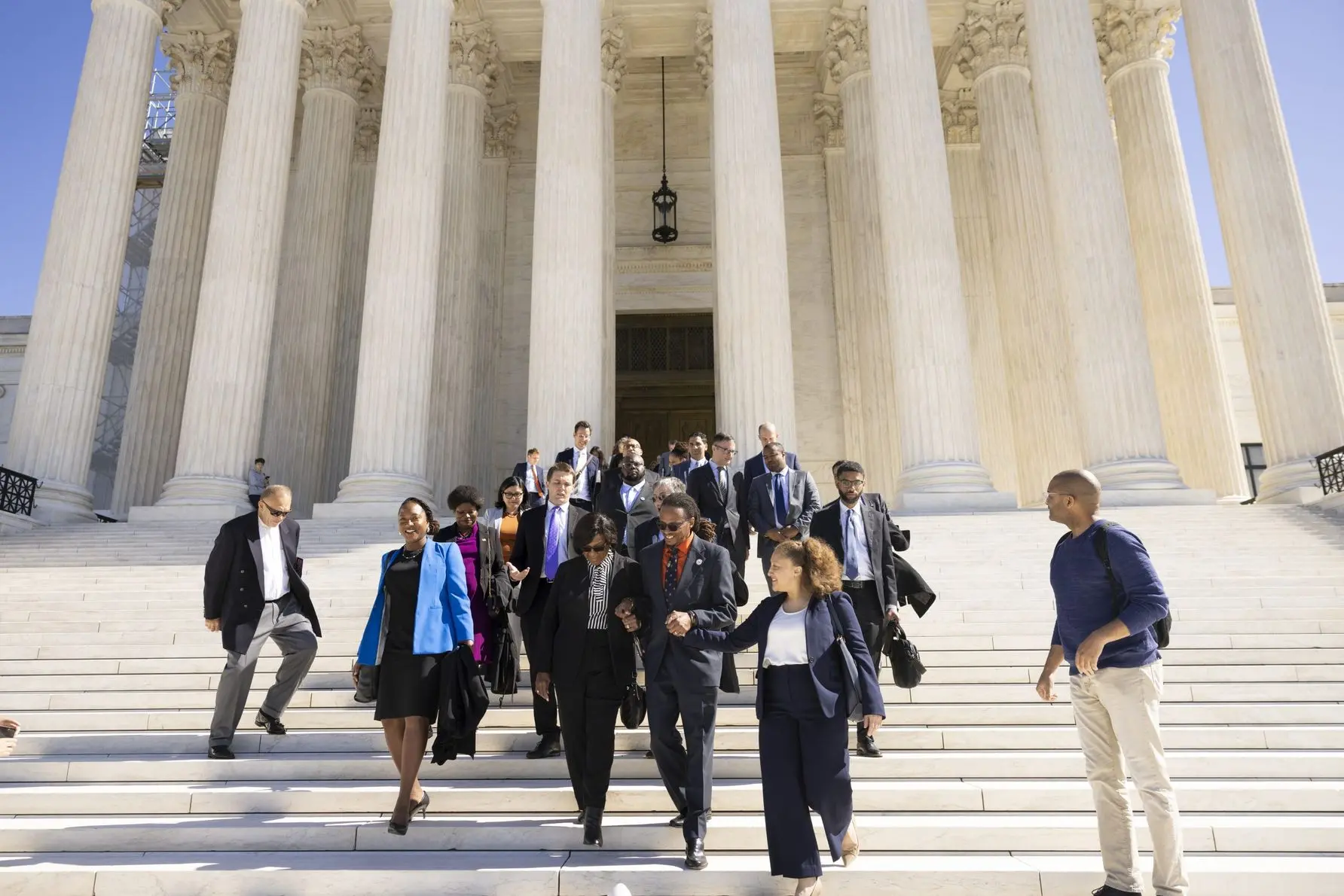 The LDF legal team, staff, clients, and supporters exit the Supreme Court following arguments in Alexander v. South Carolina State Conference of the NAACP.