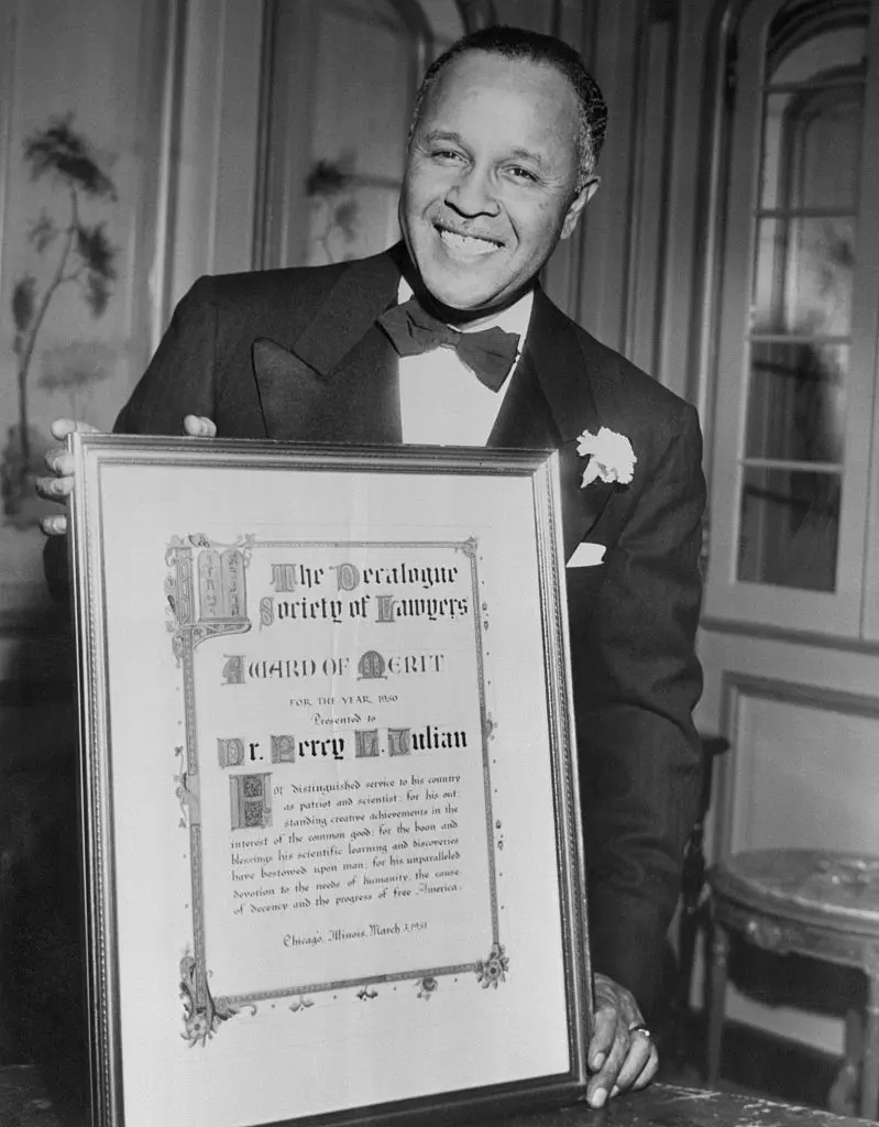 Percy Lavon Julian (1899 - 1975): Julian was a chemist whose experimentation with soybeans led to the invention of physostimine, a drug used to treat glaucoma. He also learned how to mass produce cortisol and progesterone, leading to the development of birth control and other hormonal treatments. Photo via Getty Images.