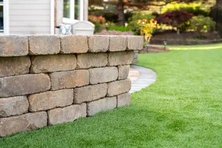 Close up of artificial turf fibers showing realistic texture