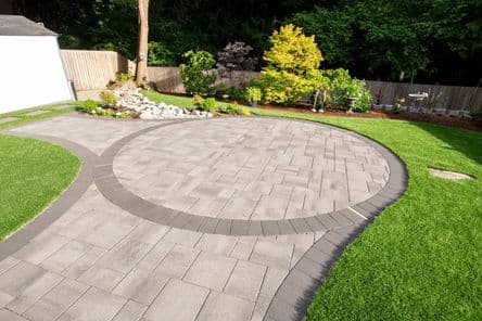 Artificial turf installed around a garden walkway