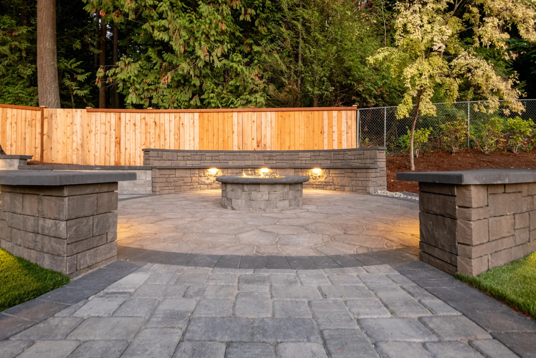 Overview of the connected paver patios and outdoor living zones
