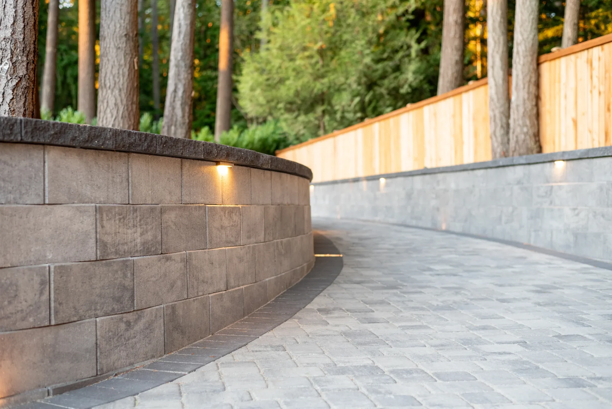 Paver steps with integrated landscape lighting