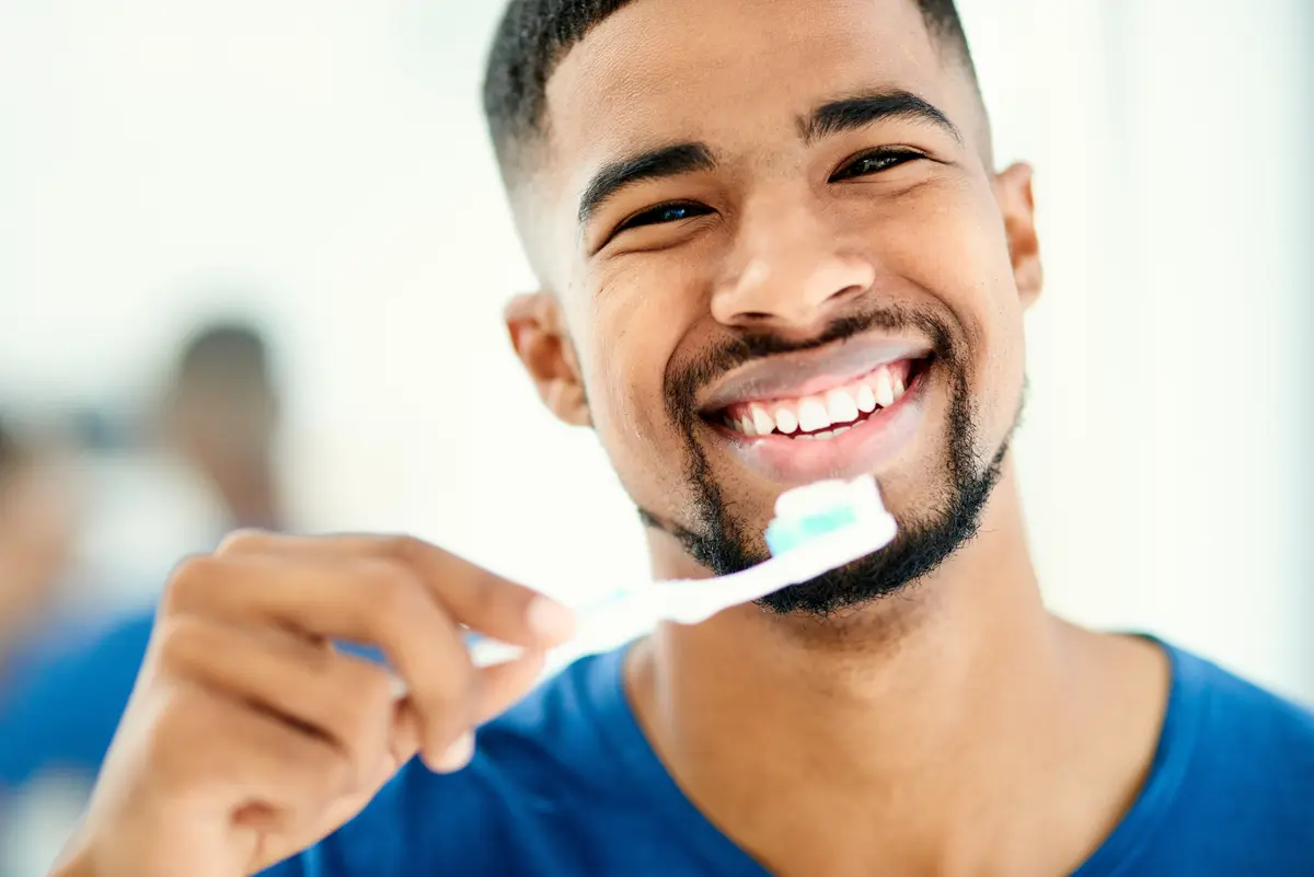man with toothbrush