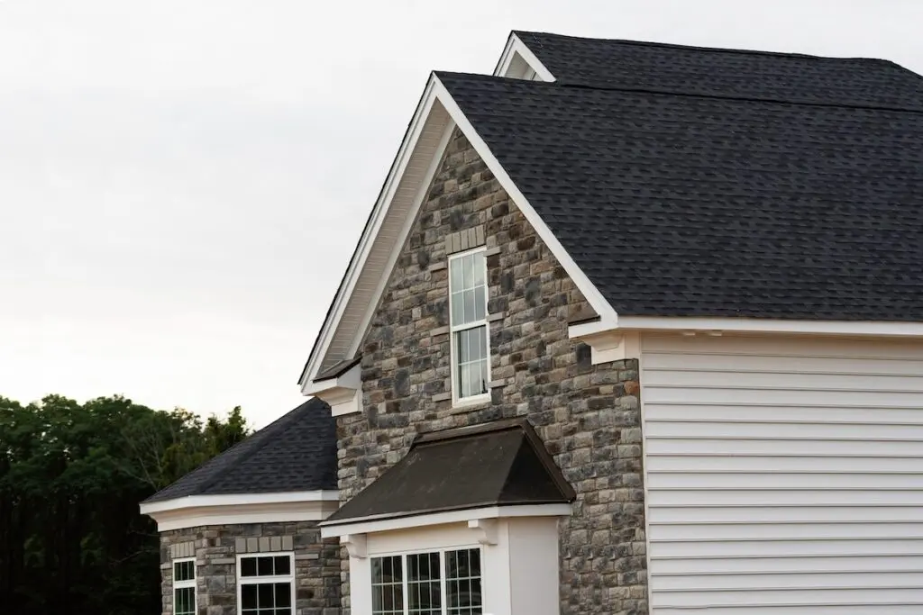 new roof on newly built house with black shingles