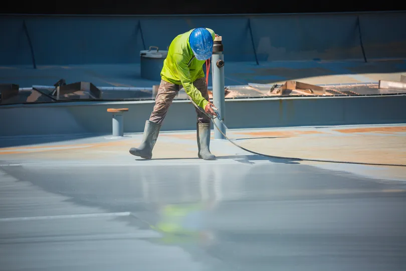 Spray roof coating - roofing contractor