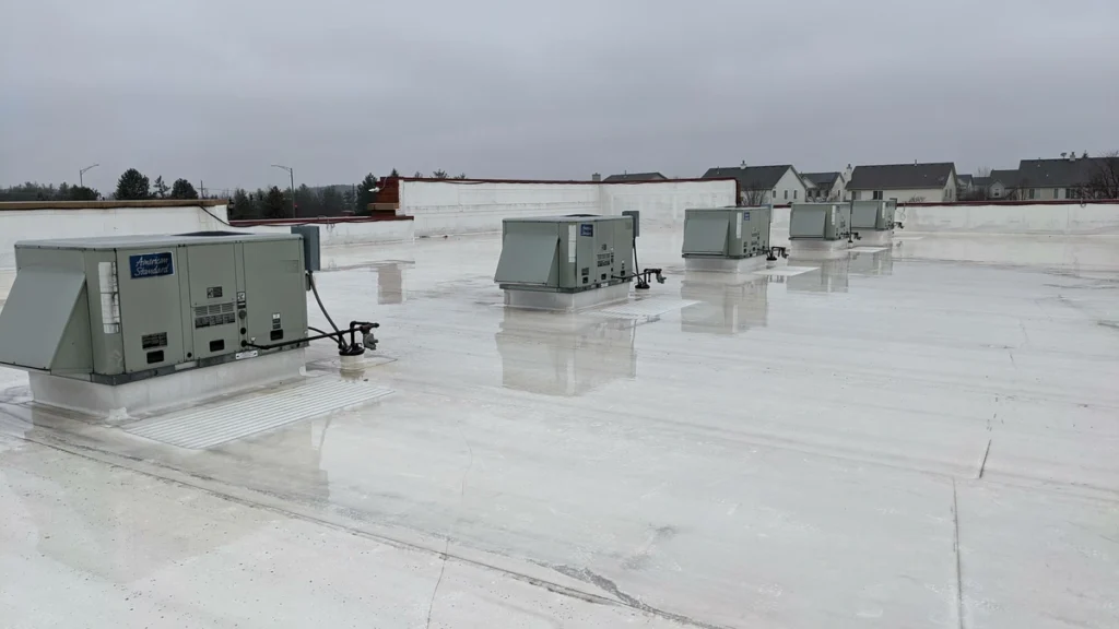 roof coatings-white coating on a commercial roof