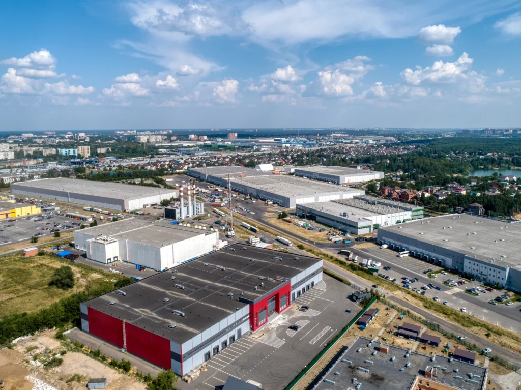 aerial view of carmi in - multiple commercial flat roof buildings