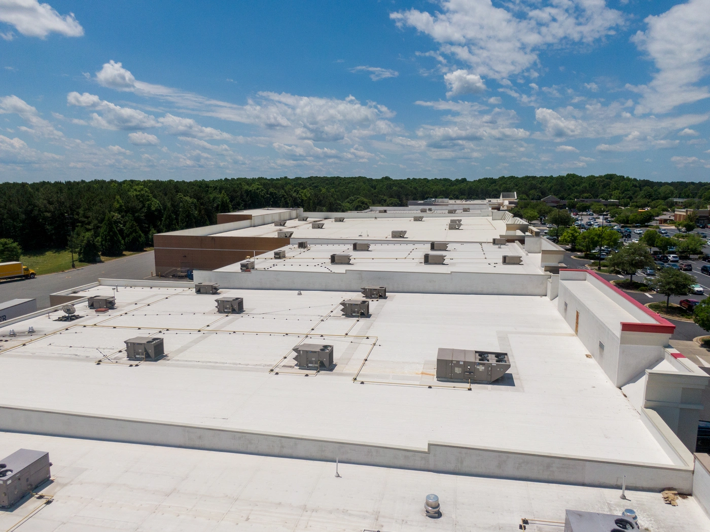 TPO roof installation on large scale new construction roofing project