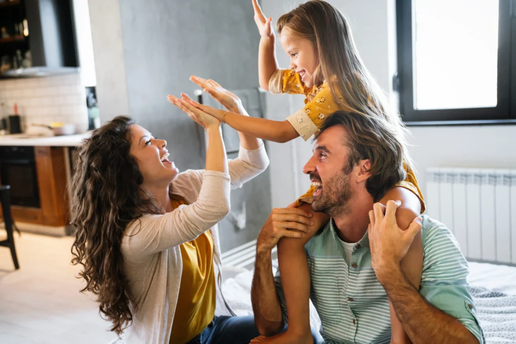 young parents spending time with their kid